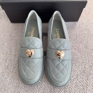 CHANEL Quilted Mint Green Leather Loafers with Gold Heart Hardware